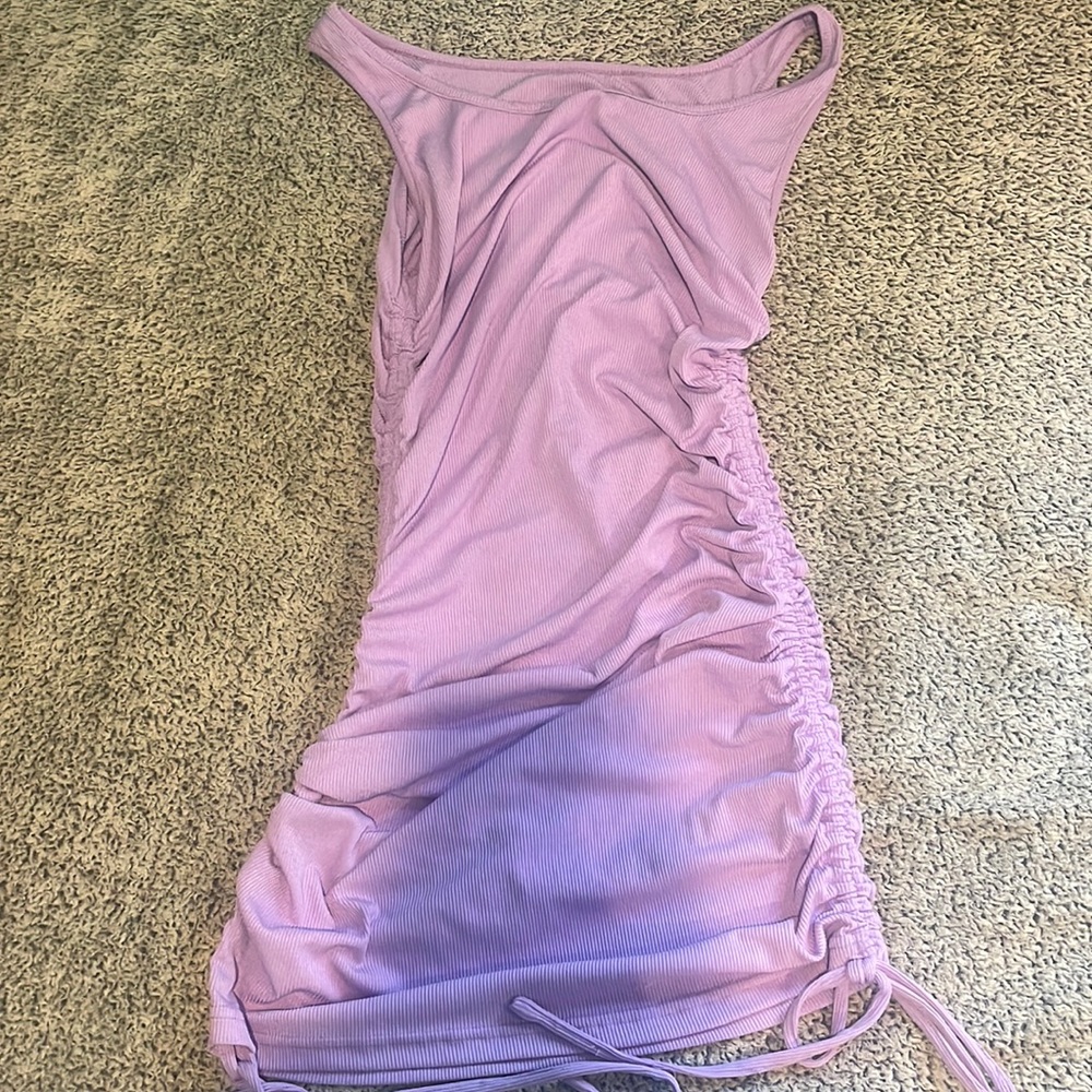 purple dress, adjustable length with the strings on the side, worn once